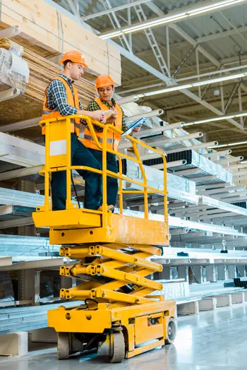 tall-scissor-lift-with-man