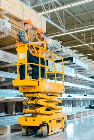 tall scissor lift with man